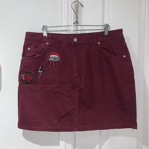 Maroon skirt with patches